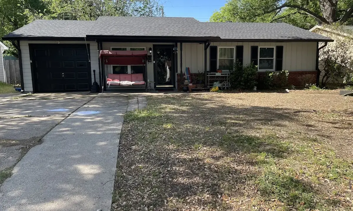 Asphalt Shingle Roof Repair crew at work on a residential roof in University of Virginia